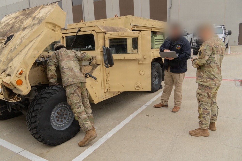 Texas National Guard soldiers checking a vehicle ahead of Winter Storm Fern, January 2026.